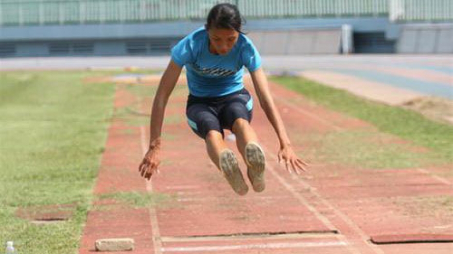 Jumper Hue Hoa wins gold at Singapore Open 