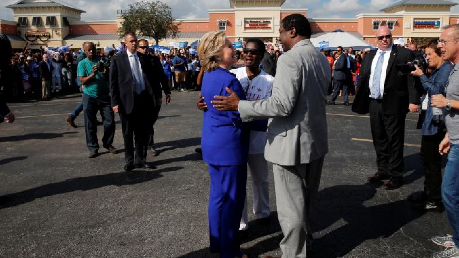 Trump, Clinton blast each other on character; Clinton rises in poll