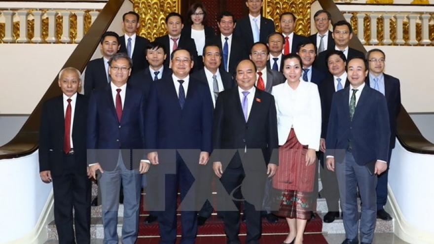 PM urges higher bilateral trade with Laos
