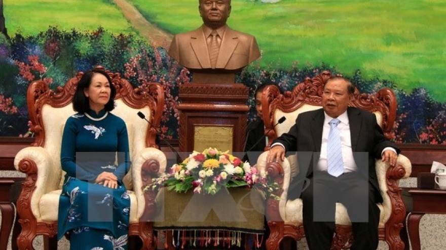 Vietnam, Laos Parties step up theoretical information exchanges