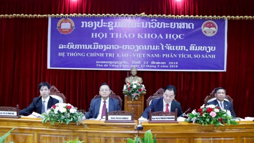 Vietnam, Laos review political system