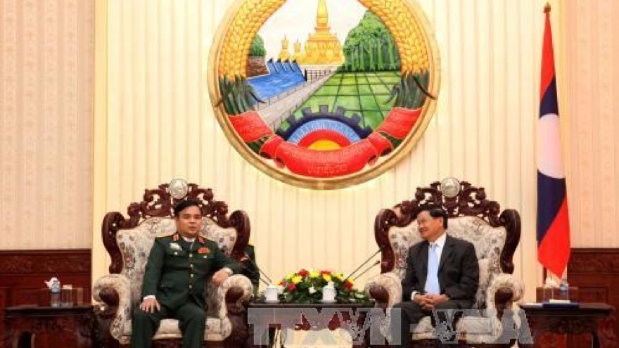 Lao PM urges closer coordination in searching fallen Vietnamese soldiers