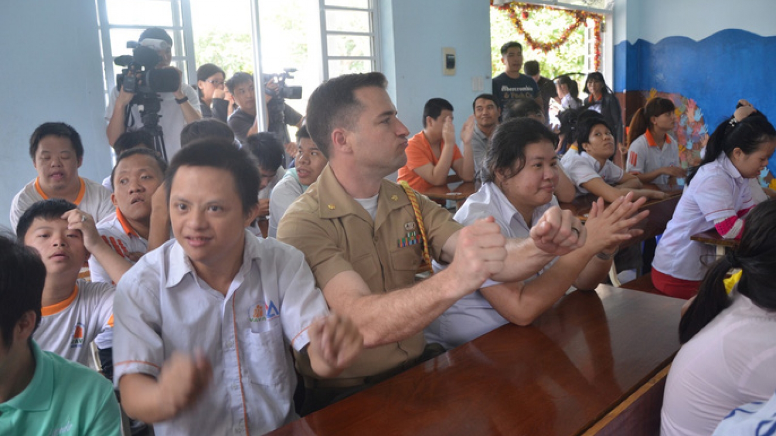 US Navy officers join exchange with Agent Orange children