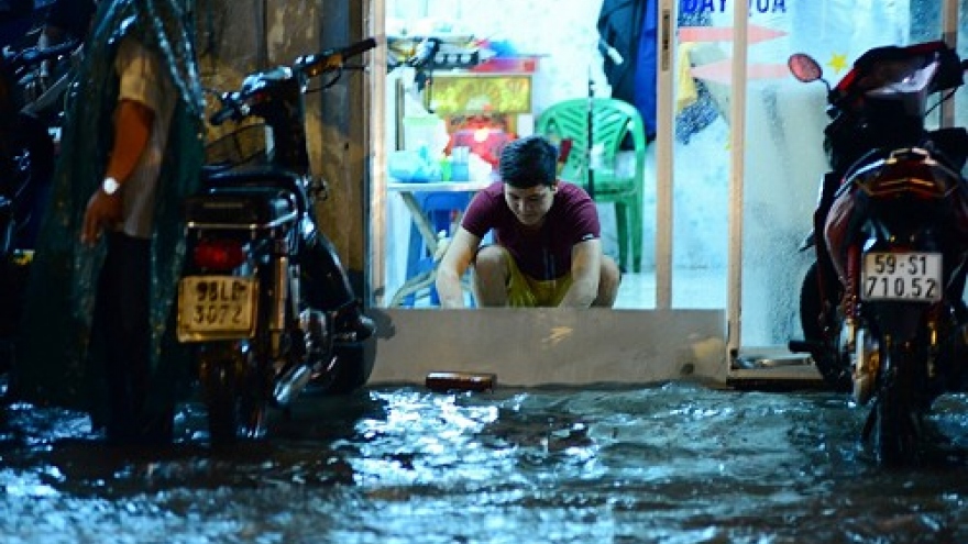 HCM City copes with flooding after torrential downpour