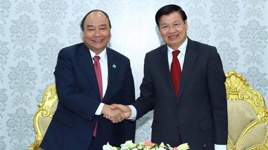 Vietnamese, Lao PMs visit Star Telecom