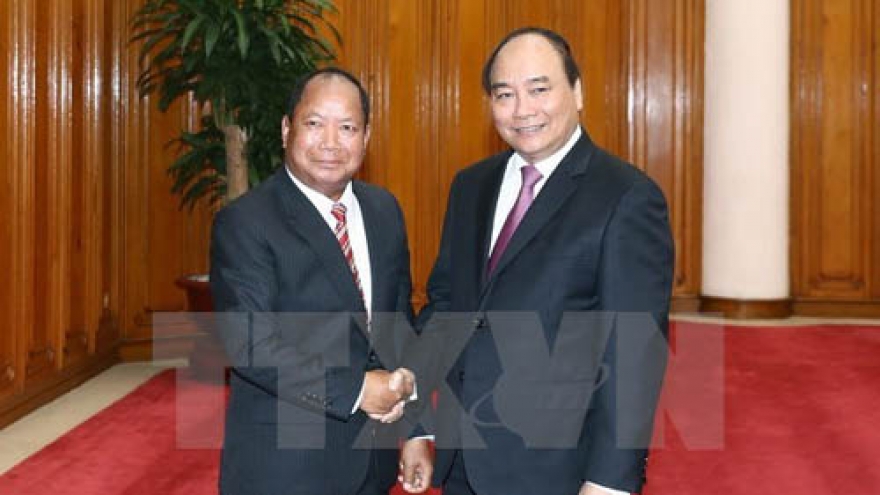 PM calls for stronger security ties with Laos