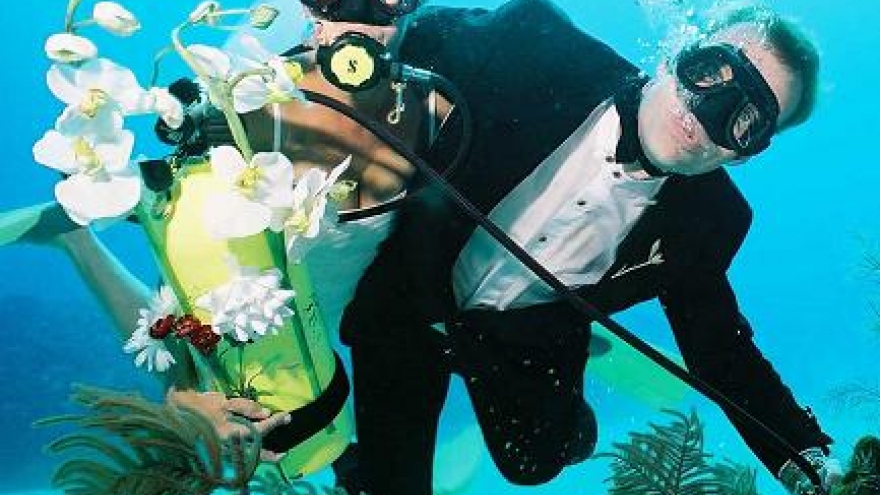 Trang holds Underwater Wedding