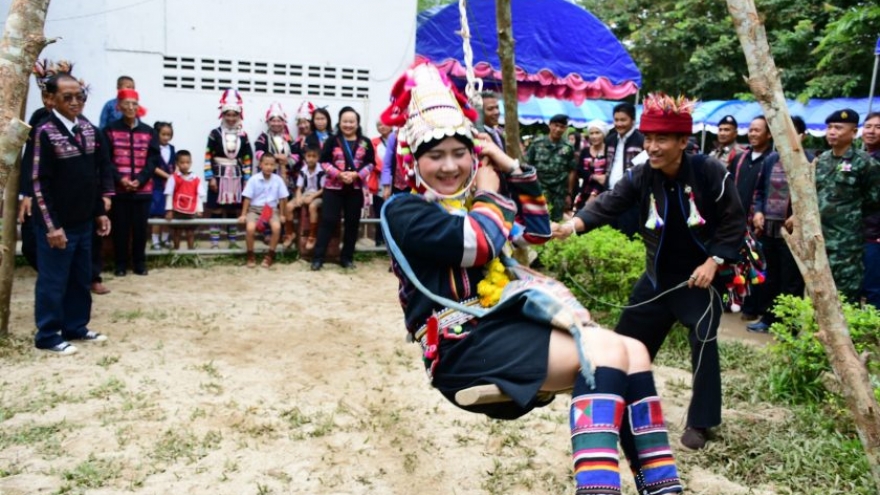 Traditional Akha swing pushing ceremony held in Chiang Rai