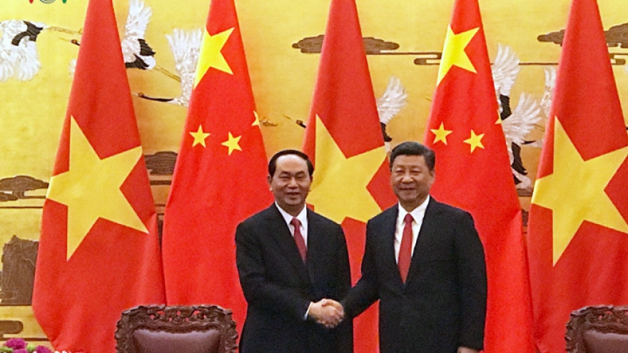 In photos: President Quang’s first day in China