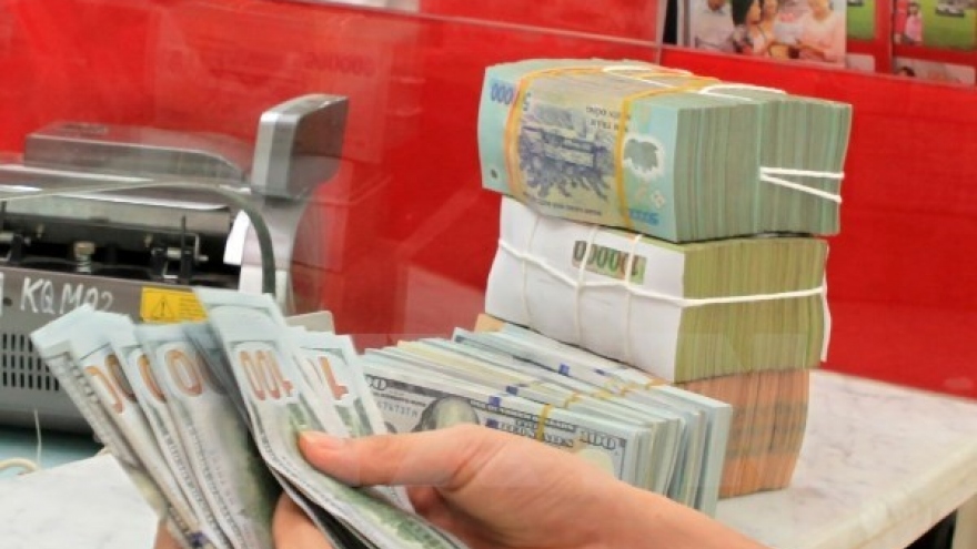 Reference exchange rate goes up 7 VND