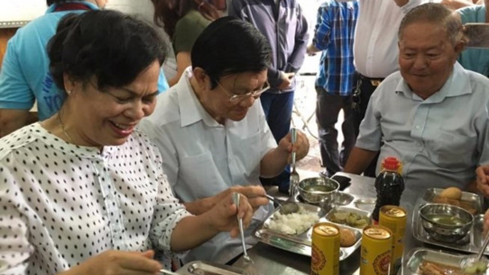 Former State President Sang, his wife share charity lunch with the poor
