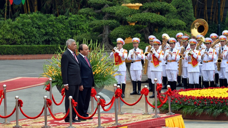 In Photos: Sri Lanka PM welcomed in Hanoi