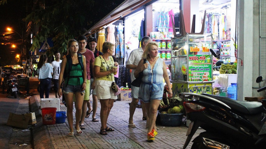 Busy ‘Western Street’ by night in Nha Trang