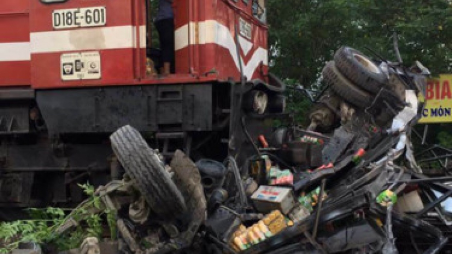 No serious injuries after train hits soft drink delivery truck