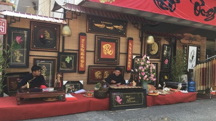 Traditional calligraphy markets welcome Tet