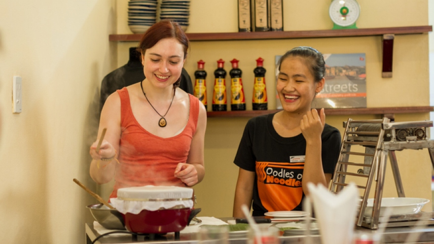 Off the street, into the kitchen: Vietnamese kids find path out of poverty