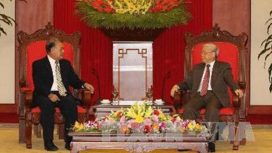 Former Party Chief receives 65-year Party badge
