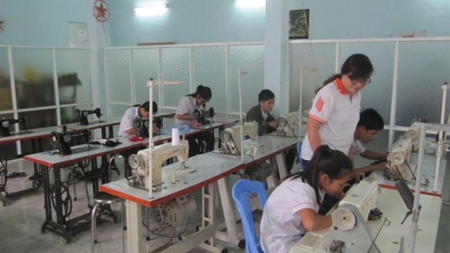 Vietnam focuses on education for kids with disabilities