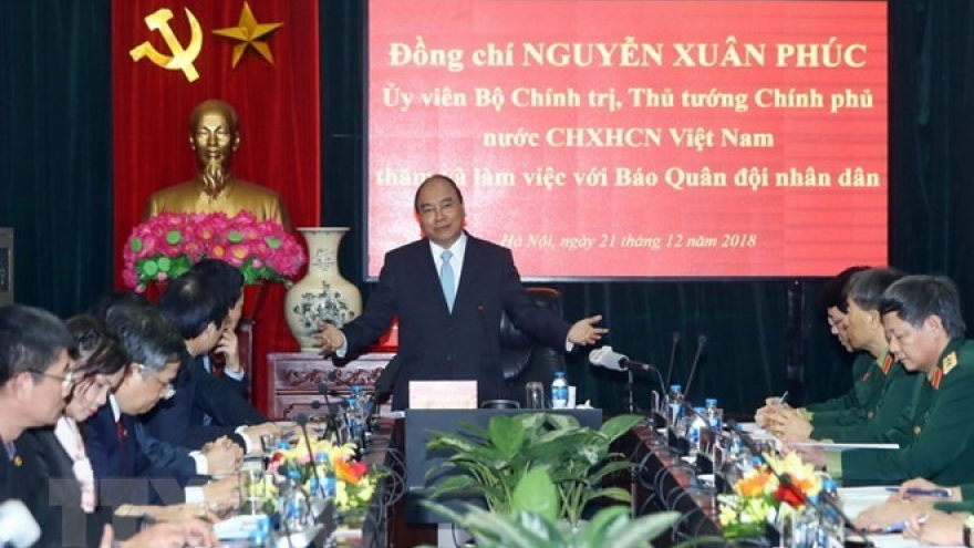 PM hails Quan doi Nhan dan newspaper for national contributions