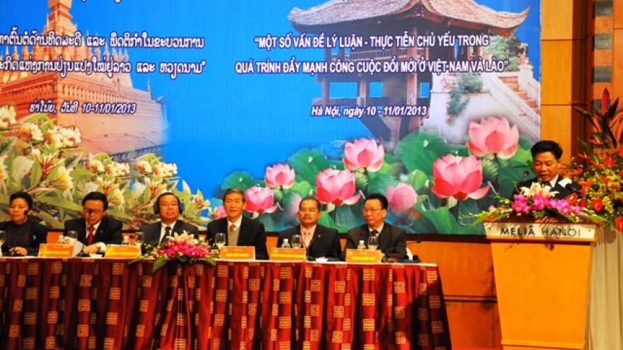 Vietnam, Laos Parties share theoretical work