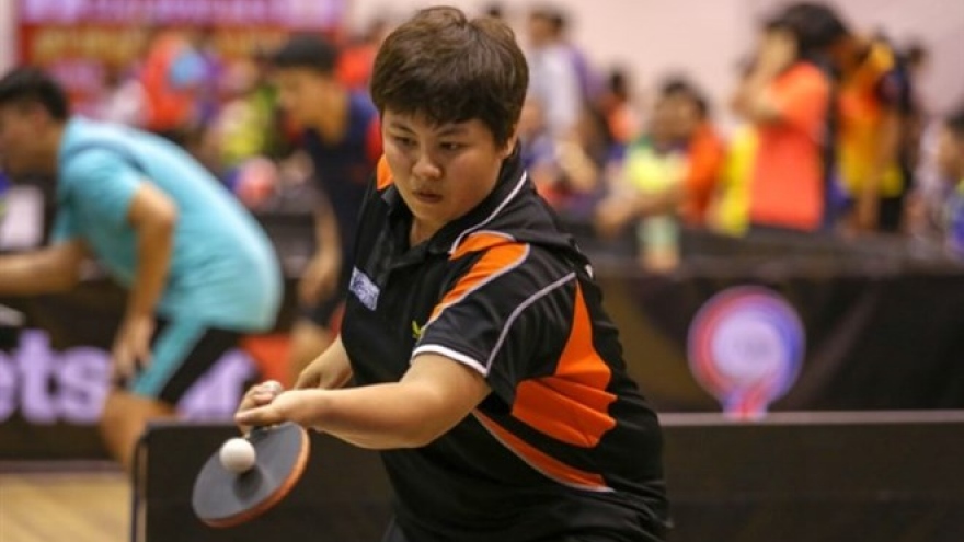 
        Vietnamese, Japanese players in table tennis exchange
                              