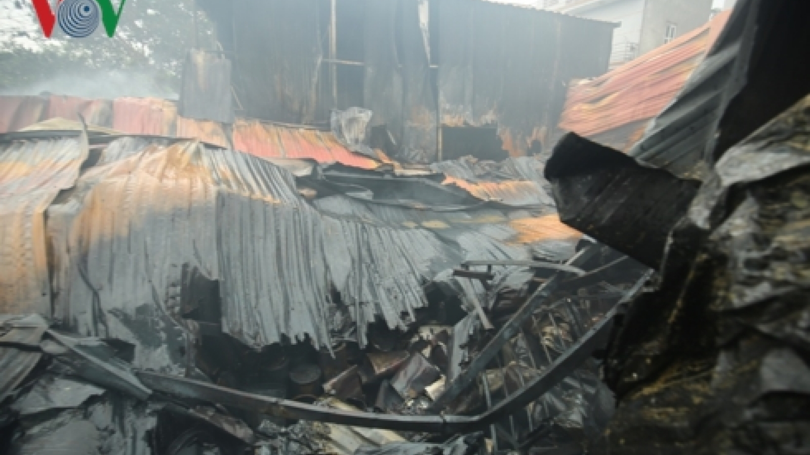 In photos: eight dead as fire destroys Hanoi workshop