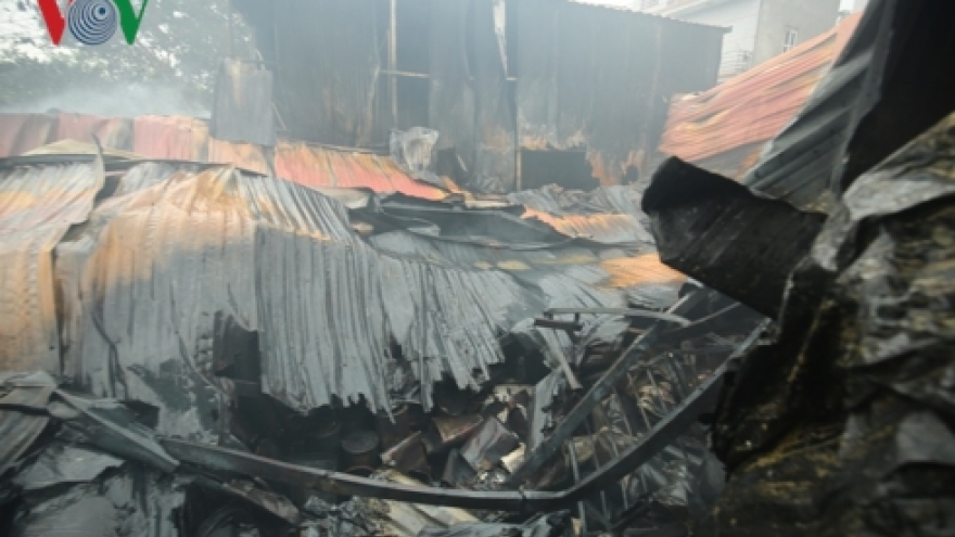 In photos: eight dead as fire destroys Hanoi workshop