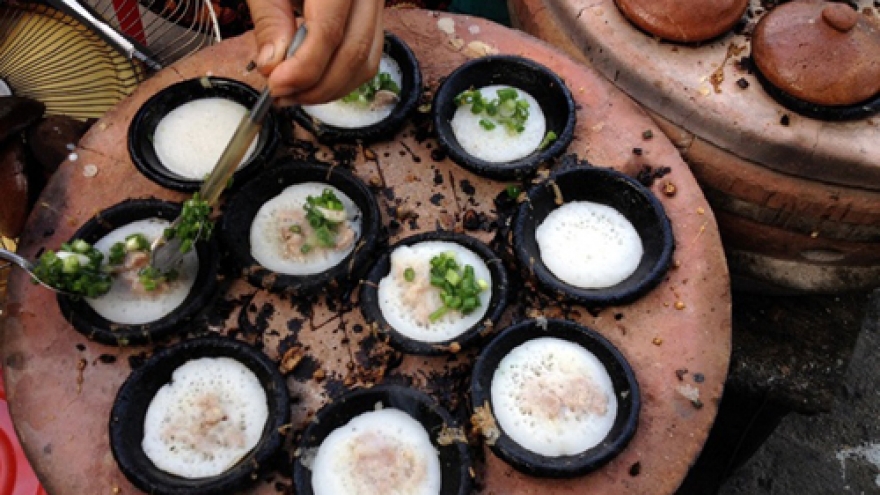 Firing up breakfast pancakes Vietnam-style