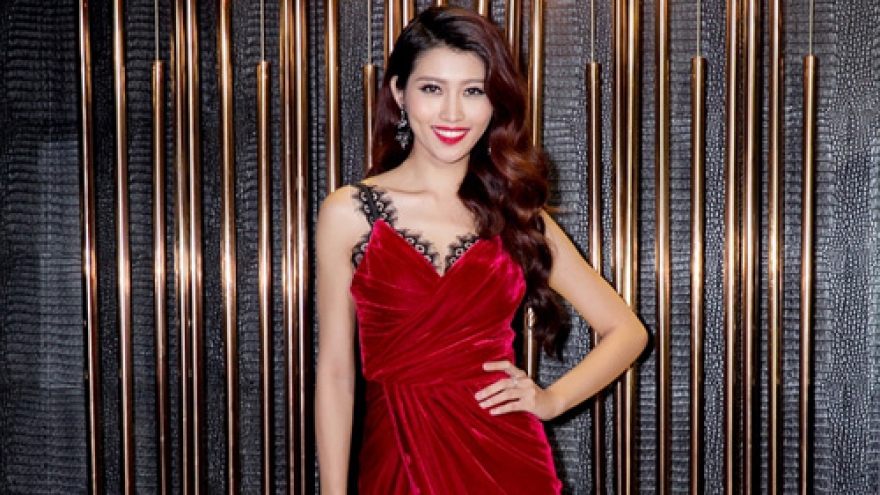 Quynh Chau looks smokin' hot in red silk dress