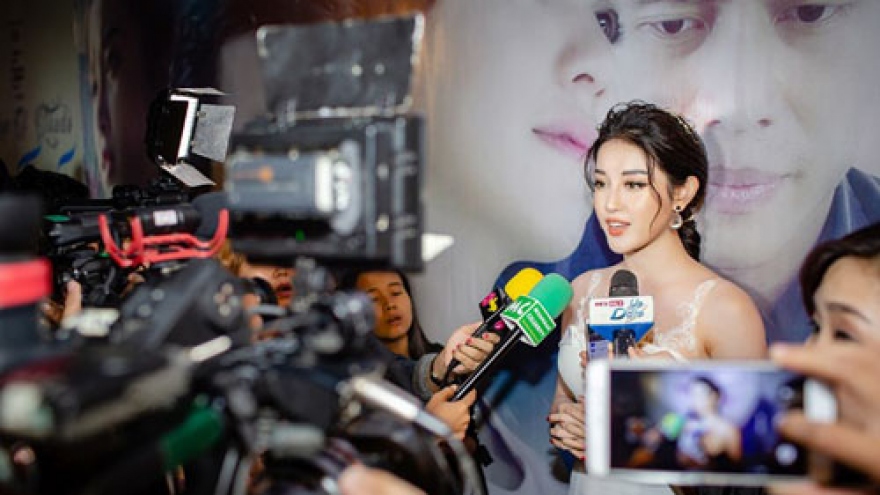 Huyen My glamorous in white at Myanmar film debut