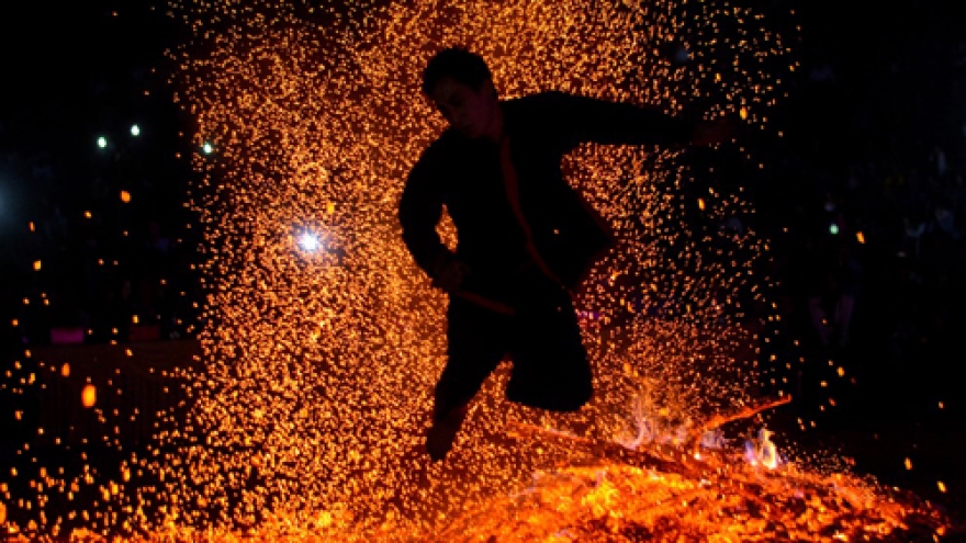 Pa Then ethnic people perform fire dancing for Lunar New Year celebration
