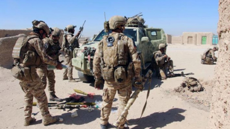 Car bomb kills at least 10 police in besieged Afghan city
