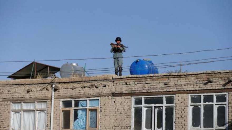 Attacks in Afghan capital kill at least 24