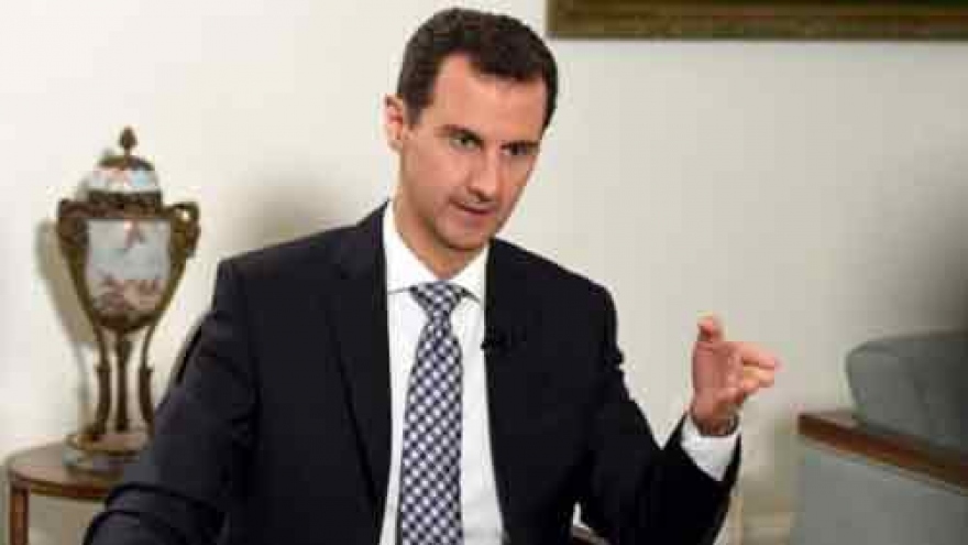 Assad says he can form new Syria government with opposition