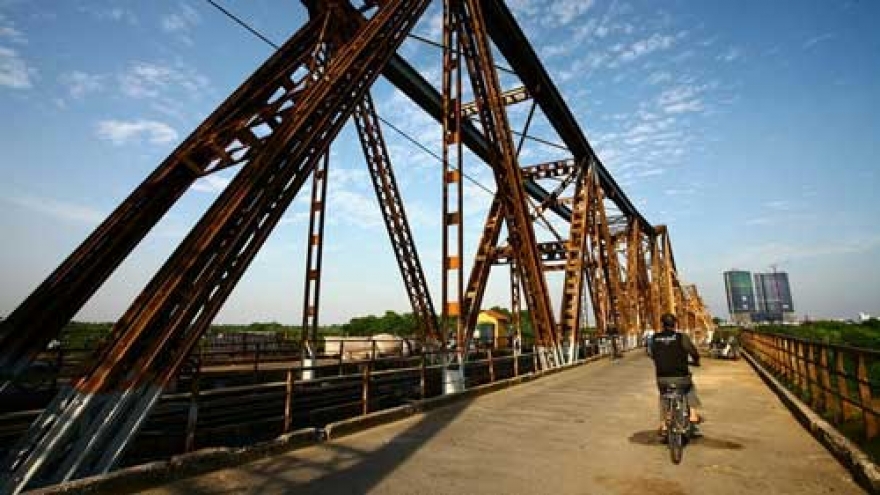 Legendary Long Bien bridge in autumn afternoon