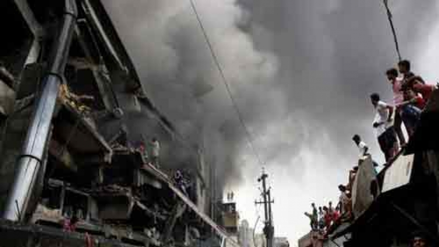 Bangladesh factory owner, others flee as toll from fire rises