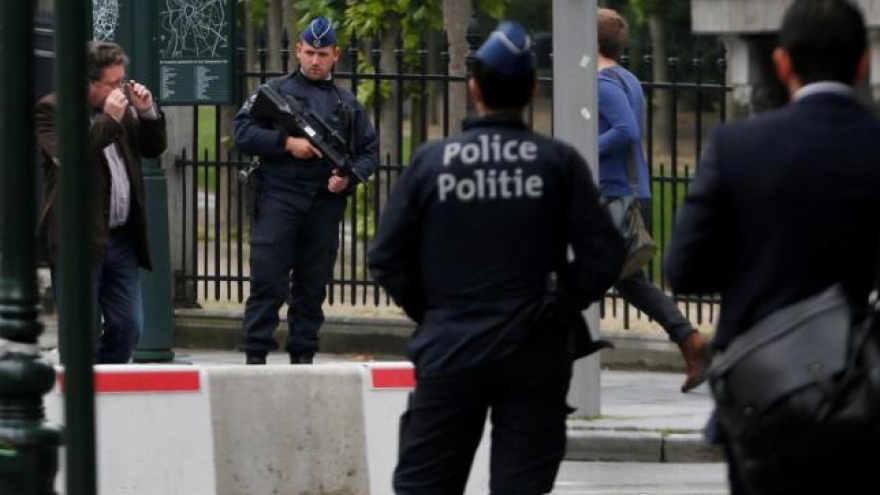 Belgium charges three men with terrorism offences after overnight raids