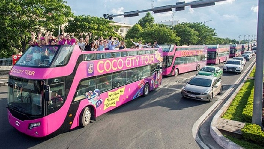 Two double-deckers ready to parade Vietnam U23s around Hanoi