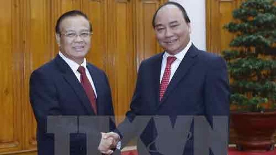 Government leader hosts Lao Deputy Prime Minister