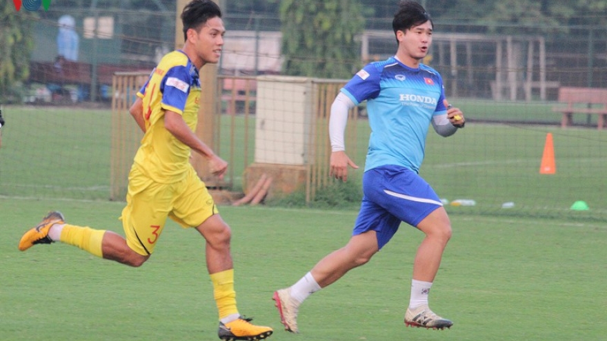 National team footballers practice UK football drills