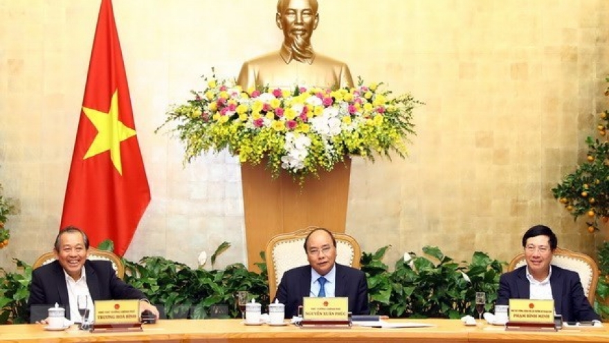 PM urges prompt resumption of work following Tet holiday