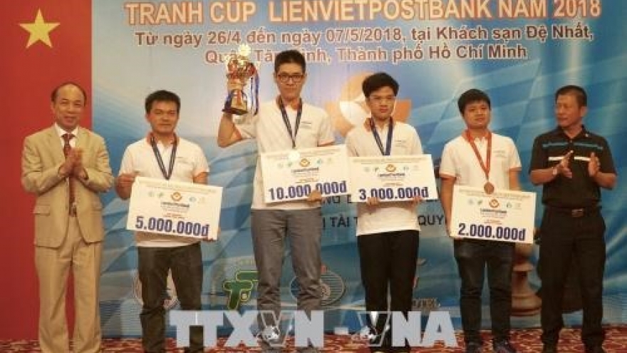 Minh wins two titles at national chess tourney