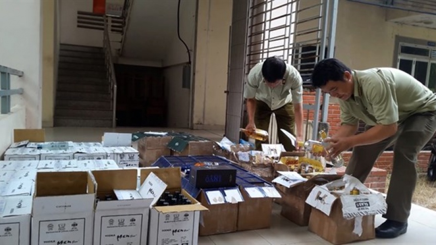 
        Fake booze, cigars flooding country as Tet nears
                              