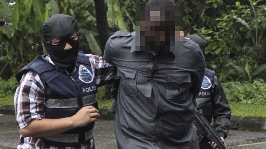 Malaysia arrests 14 suspected IS members