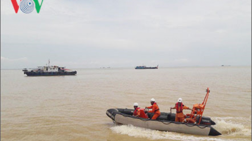 Divers locate body of 1 missing after cargo ship capsizes