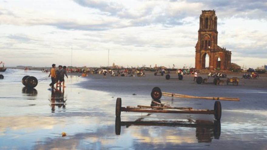 Bustling fishing activity around the ruined church in Nam Dinh
