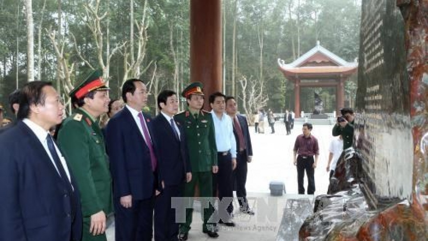 President Tran Dai Quang visits K9-Da Chong historic site