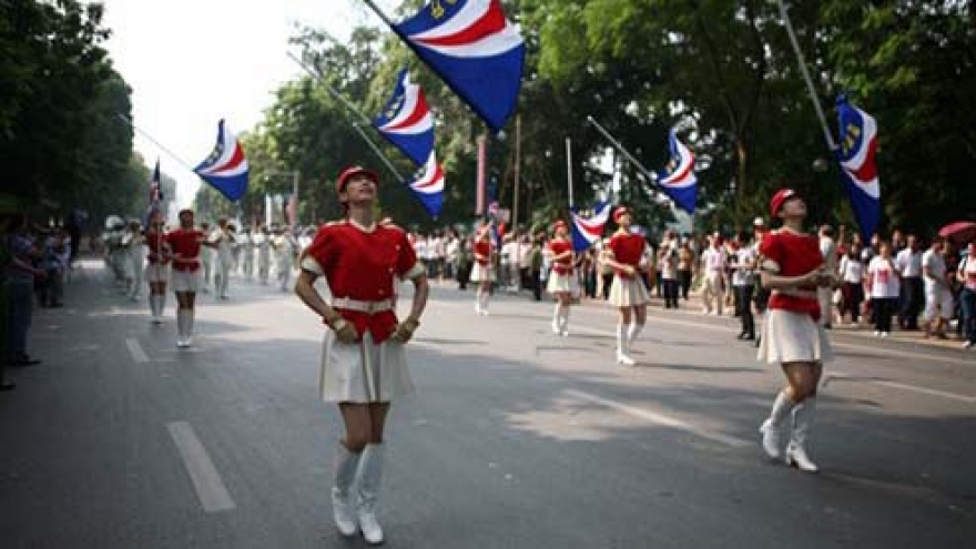 Police parade through streets of HCM City