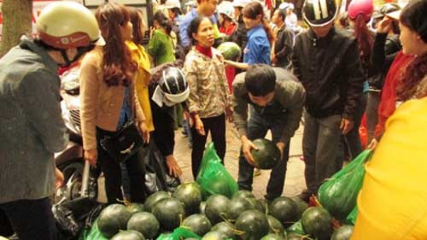 Local people buy watermelons to help flood-hit farmers