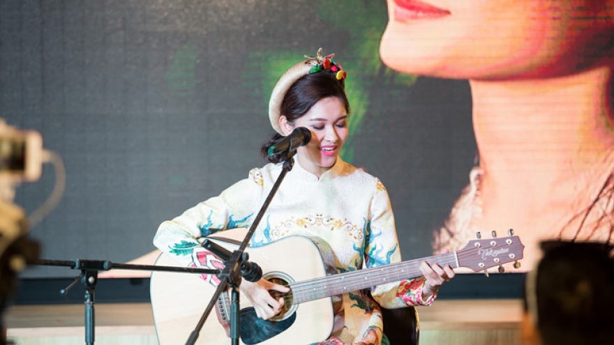 Thuy Dung charming in Ao Dai at HCM City event